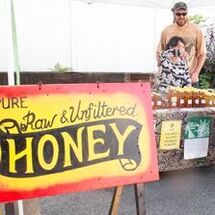 Picture of R&A Honey Bees selling at market